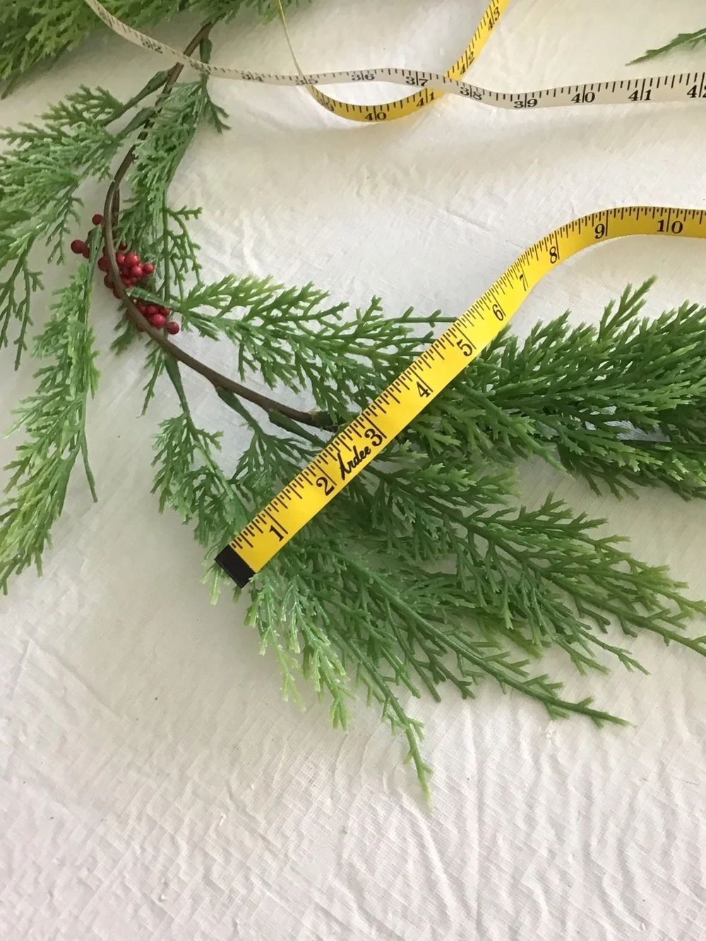 Ashland Green Cedar Garland with Red Berry Accents